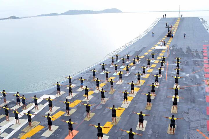  Yoga being performed onboard aircraft carrier INS Vikramaditya 