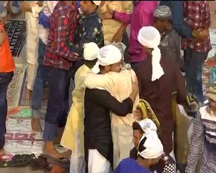 Muslims greet each other on Eid in New Delhi. 