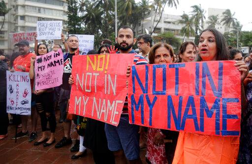 Bollywood actress Shabana Azmi joined by others in protest. PIC/AP.