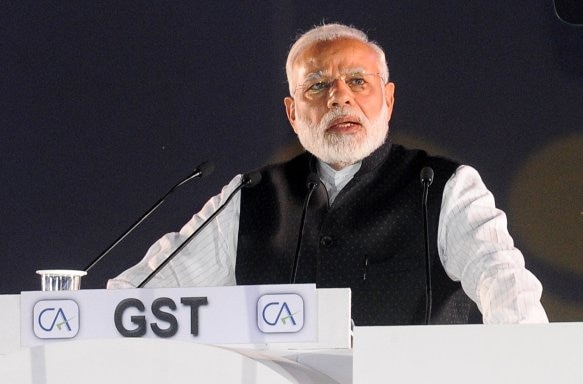 Tough action against those helping hide black money, PM Modi tells CAs