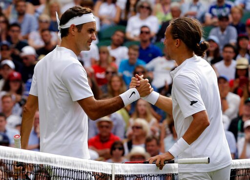 Federer, Djokovic get free passes at Wimbledon Federer, Djokovic get free passes at Wimbledon