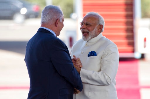PM Modi's attire in Tel Aviv evinces India's keen interest in working with Israel PM Modi's attire in Tel Aviv evinces India's keen interest in working with Israel