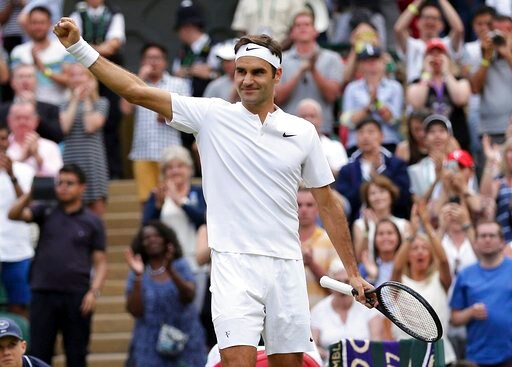 Federer, Djokovic enter last 16 at Wimbledon Federer, Djokovic enter last 16 at Wimbledon