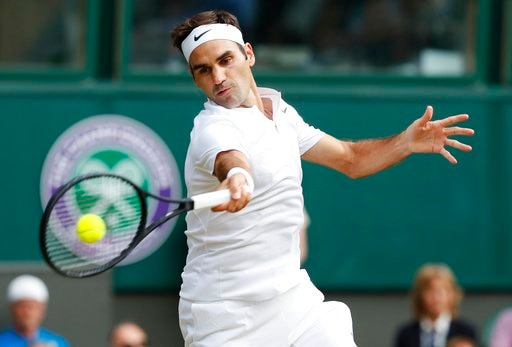 Federer, Murray ease into Wimbledon quarters Federer, Murray ease into Wimbledon quarters