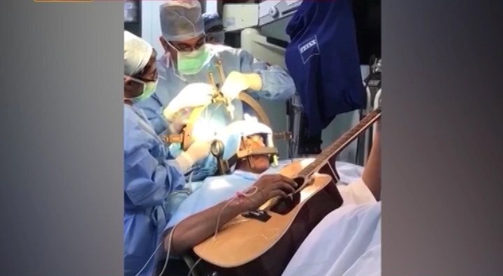 Bengaluru: Patient strums guitar as doctors perform operation Bengaluru: Patient strums guitar as doctors perform operation