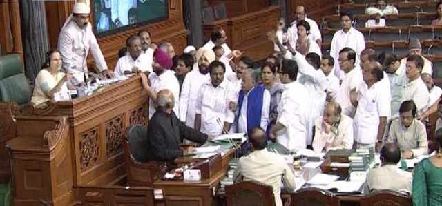 Cow-based lynching issue rocks Lok Sabha: Six Congress MPs suspended for throwing papers at Speaker  Cow-based lynching issue rocks Lok Sabha: Six Congress MPs suspended for throwing papers at Speaker