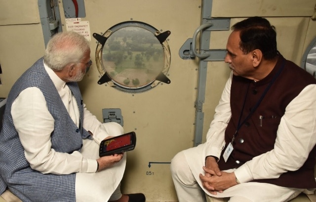 PM takes stock of Gujarat flood situation, announces Rs 2 lakh ex-gratia for kin of dead PM takes stock of Gujarat flood situation, announces Rs 2 lakh ex-gratia for kin of dead