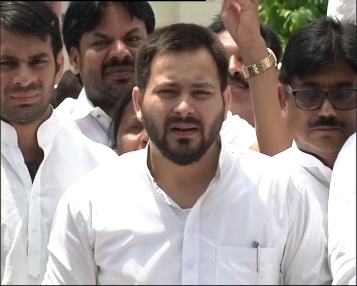 Tejashwi Yadav sees 'big BJP conspiracy' in attacks on north Indians in Gujarat Tejashwi sees 'big BJP conspiracy' in attacks on north Indians in Gujarat