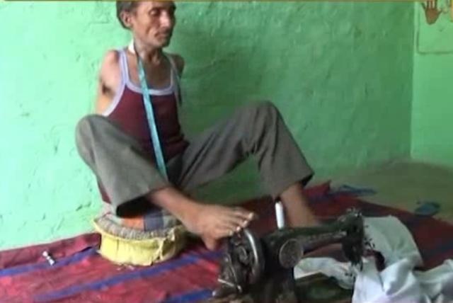 Viral Sach: Defying odds, 45-year-old armless tailor stitches clothes with his feet Viral Sach: Defying odds, 45-year-old armless tailor stitches clothes with his feet