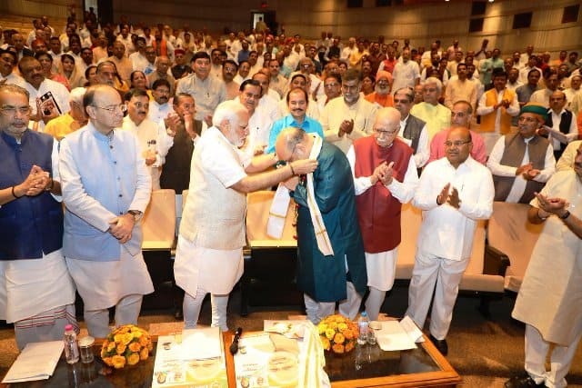 Sweets were distributed as PM Narendra Modi congratulated his confidant. PIC/BJP Live Twitter