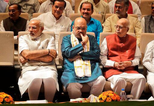 Addressing the Bharatiya Janata Party's parliamentary party meeting here, Modi said Shah had steered it to be the largest democratic political party in the world, according to sources who attended the gathering. (Photo: AP)