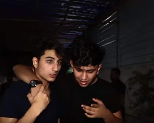 Ibrahim was stepping out with his friend, who had his arms around Ibrahim’s neck. On finding that Ibrahim was leaving with his friend Malaika Arora Khan grew concerned. ( Picture taken from Viralbollywood's video on YouTube.)