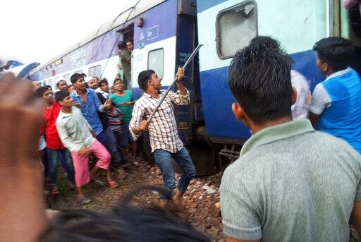 Senior Superintendent of Police Anant Deo told IANS that 22 people had died: 20 in Muzaffarnagar district and one each in hospitals in Ghaziabad and Meerut where they had been taken by their families. All but two of them were identified. Over 150 injured were being treated in Muzaffarnagar and Meerut. (AP Photo)