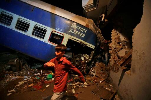 Investigators were on Sunday looking into what caused one of the deadliest train accidents in recent times as rescue operations continued, checking to see if there were people still trapped in the mangled coaches of the Utkal Express that derailed on Saturday. (Photos: AP)