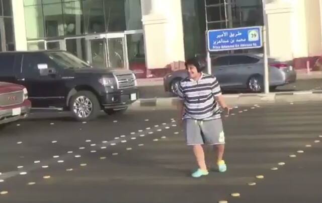 The video of the boy dancing in the street went viral on social media.