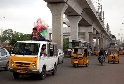 An idol of the elephant-headed Hindu God Ganesha is transported in a truck during Ganesh Chaturthi festival in Hyderabad, India, Friday, Aug. 25, 2017. The Ganesha idols are immersed in water bodies at the end of the ten-day festival. (AP Photo/Mahesh Kumar A.)