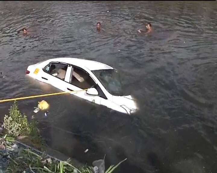 Rescue work on to pull the car out.