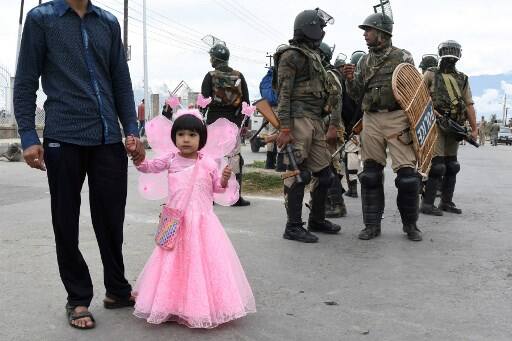 Chief Minister Mehbooba Mufti offered Eid prayers at Syed Sahib Shrine in a high security area of Srinagar city. Separatist leaders, Syed Ali Shah Geelani and Mirwaiz Umer Farooq were placed under house arrest in Srinagar to prevent their participation in Eid prayers. PIC/AFP Srinagar.