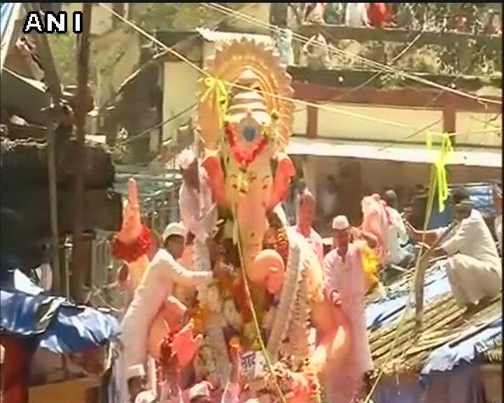 Police have beefed up security and companies of the State Reserve Police Force are also being deployed. (Idol immersion procession of #LalbaugChaRaja. PIC/ANI.)
