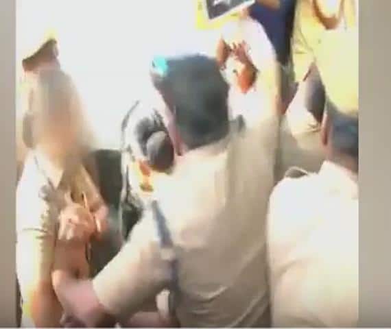 The man who appears to be molesting her is Assistant Commissioner (AC) Jayaram.    A video clip shot on Monday near the Gandhipuram signal in the central part of the city.   The footage shows even women wearing Khaki aren't safe.