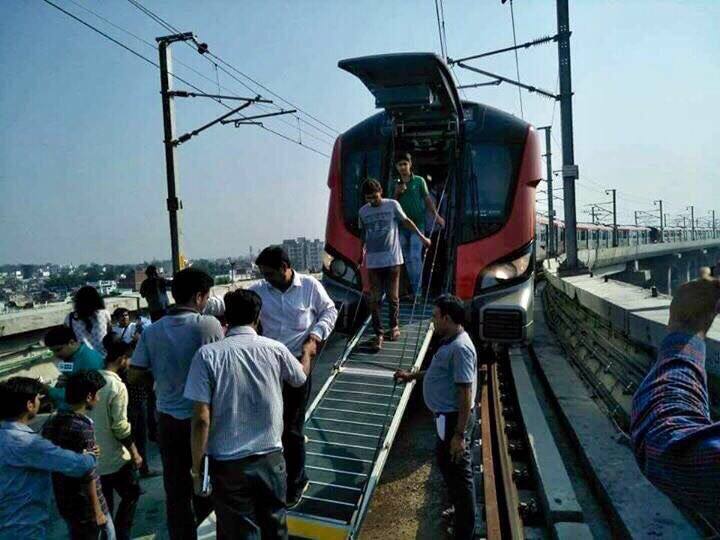 Hundreds of passengers were stuck inside the Lucknow Metro for over an hour due to a technical snag today, the first day of its commercial run, officials said. PIC/ @pankajjha_ Twitter. 