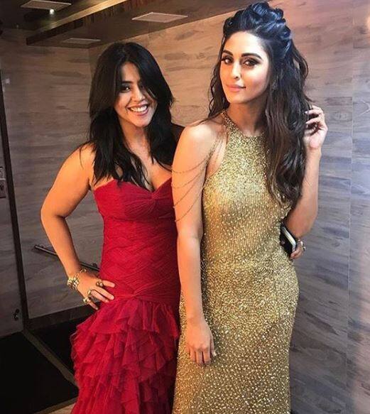 Producer Ekta Kapoor’s red hot look shook us all while her friend popular TV actress Krystle D'Souza had a gold look from top to bottom. (Image Courtesy- Instagram)