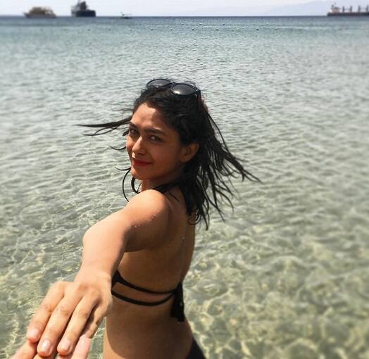 This fitness and travel freak actress took to Instagram and shared a bikini picture with her sister. (Image- Instagram @mrunalofficial2016)