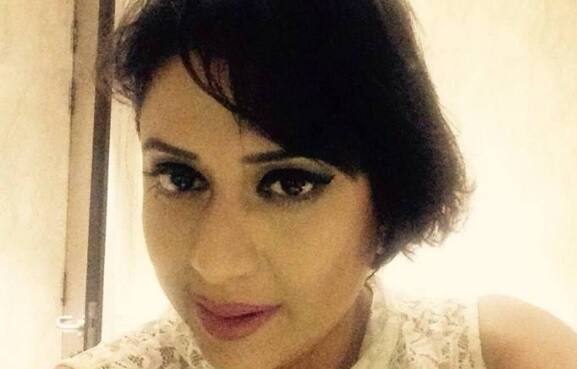 The men snatched the keys of the vehicle, dragged her out and touched her inappropriately, an officer of Behala Police Station, where a case has been lodged, said.