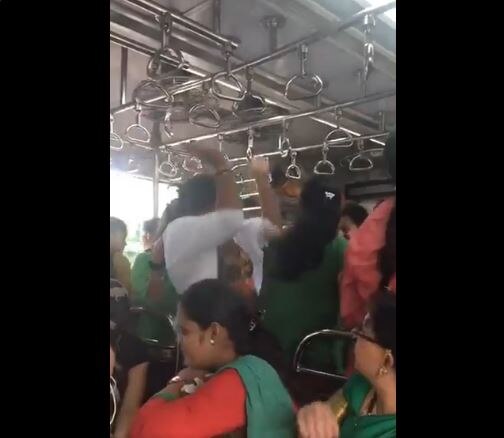 Women perform Garba in Mumbai local train Women perform Garba in Mumbai local train