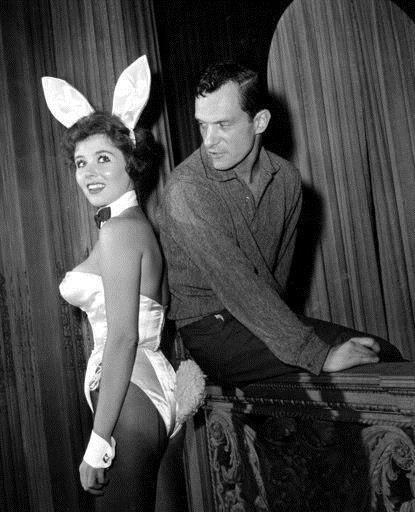 FILE - In this June 20, 1961 file photo, Playboy magazine publisher Hugh Hefner poses with