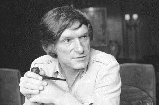 FILE - In this May 7, 1977, file photo, Playboy founder Hugh Hefner talks about his coming late night TV show, Playboys Playmate Party, Los Angeles, Calif. (AP Photo/George Brich, File)