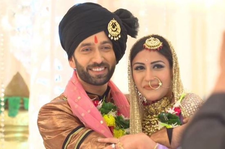 Our handsome groom, Nakuul Mehta aka Shivaay is wearing black kurta pajama teamed up with copper colored jacket. (Image Courtesy - Instagram)
