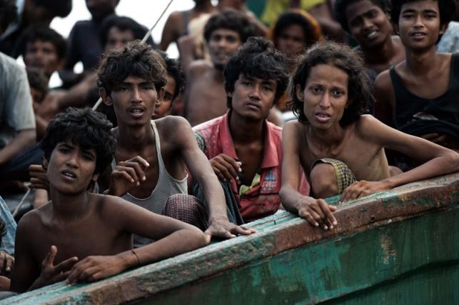 Two dead, 32 missing as boat carrying Rohingya people capsizes Two dead, 32 missing as boat carrying Rohingya people capsizes