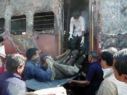 Godhra train burning case: Gujarat High Court commutes death sentence to 11 convicts into life imprisonment Godhra train burning case: Gujarat High Court commutes death sentence to 11 convicts into life imprisonment