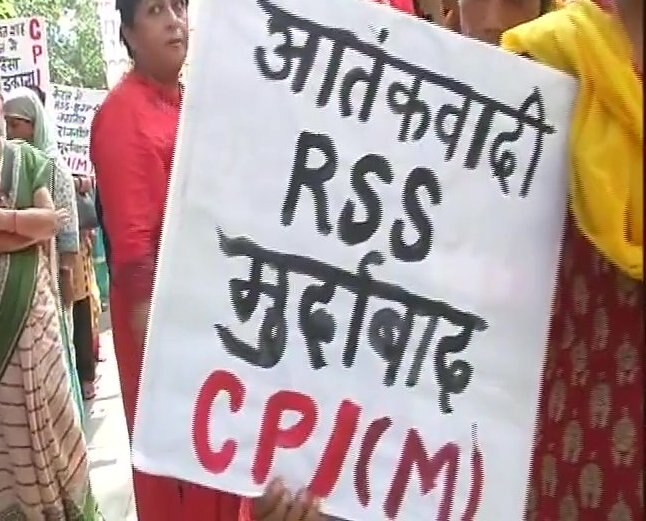 CPI-M on Monday held protest against RSS and BJP in the national capital. The protest was led by CPI-M's Prakash Karat and Brinda Karat. / ANI IMAGE