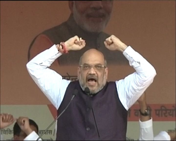 People should vote in large numbers to give a befitting reply to those opposing the Gujarat model: Amit Shah People should vote in large numbers to give a befitting reply to those opposing the Gujarat model: Amit Shah