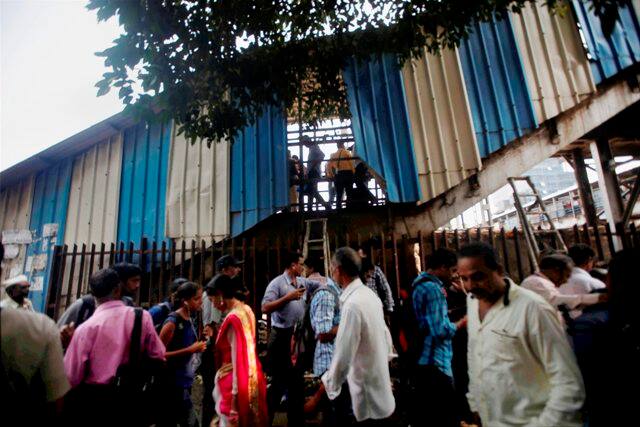 An inquiry report on the September 29 Elphinstone bridge stampede in Mumbai that killed 23 people has blamed heavy rain for the tragedy. (Photo: PTI)