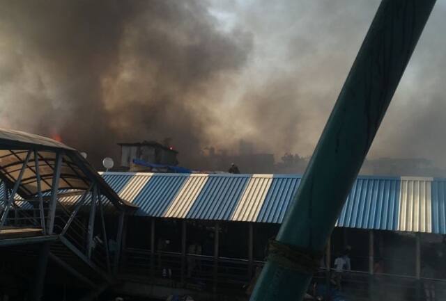 The fire broke out near the east side of Bandra local station during a demolition drive carried out by the municipal corporation, the official said. (Photo: ANI)