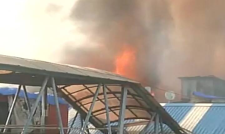 A major fire broke out at Behrampada adjacent to suburban Bandra station in Mumbai this afternoon, forcing the railway authorities to halt train services on the harbour line, a senior railway official said. (Photo: ANI)