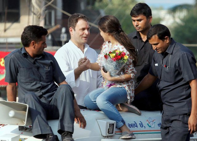 Watch: Girl climbs Rahul Gandhi's van to click selfie with him in Gujarat