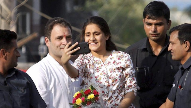 Watch video: Girl gets onto Congress Vice President Rahul Gandhi's van to take selfie with him in Gujarat Watch video: Girl gets onto Congress Vice President Rahul Gandhi’s van to take selfie with him in Gujarat