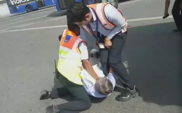 IndiGo staffer manhandles passenger at Delhi airport, video goes viral IndiGo staffer manhandles passenger at Delhi airport, video goes viral