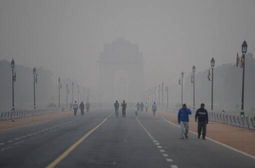 As a thick blanket of haze hung low over the city, visibility levels plunged, affecting flight and train operations. It permeated living rooms and even the underground metro stations in the city making it difficult to breathe, turning eyes watery and producing burning sensation. (AFP PHOTO)