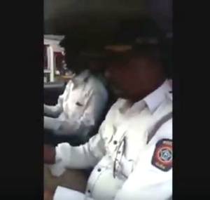 Shocking video: Mumbai policeman tows car with sick woman breastfeeding infant
