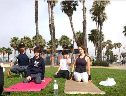 It is children's day and your favourite celebrities are posting pictures with their little ones. So we’ve brought for you some of their  oh-so-cute posts. Bollywood actor Hrithik roshan shared this picture with his boys and ex-wife Susanne. He wrote on Twitter : “Let us strive to give r children a world that is filled with love and inspiration. It all begins with the self. Happy Children's Day”. Image: Twitter 