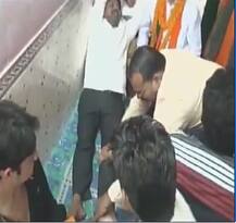 WATCH: Yogi Adityanath\'s minister Nand Gopal \'Nandi\' gets foot massage by BJP workers in Allahabad
