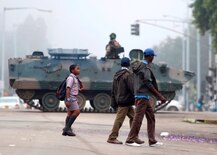 Zimbabwe army has President Robert Mugabe, wife in custody, controls capital