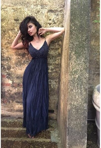 ‘Naagin’ actress Mouni Roy once again leaves her fans swooning with her hot photoshoot. Dressed in a sexy backless black gown, she looks drop dead gorgeous. (Image:Instagram)