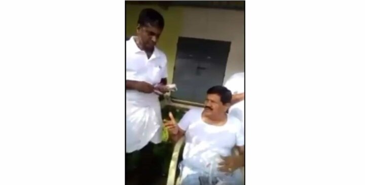 Video claims minister distributing cash & liquor to gather crowd for MGR’s centenary celebration Video claims MLA distributing cash & liquor to gather crowd for MGR centenary celebration