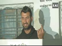 Cricketer Cheteshwar Pujara casts his vote in Rajkot, displays inked finger
